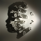 Illustration for article titled Beautiful sculptures cast surprisingly human silhouettes